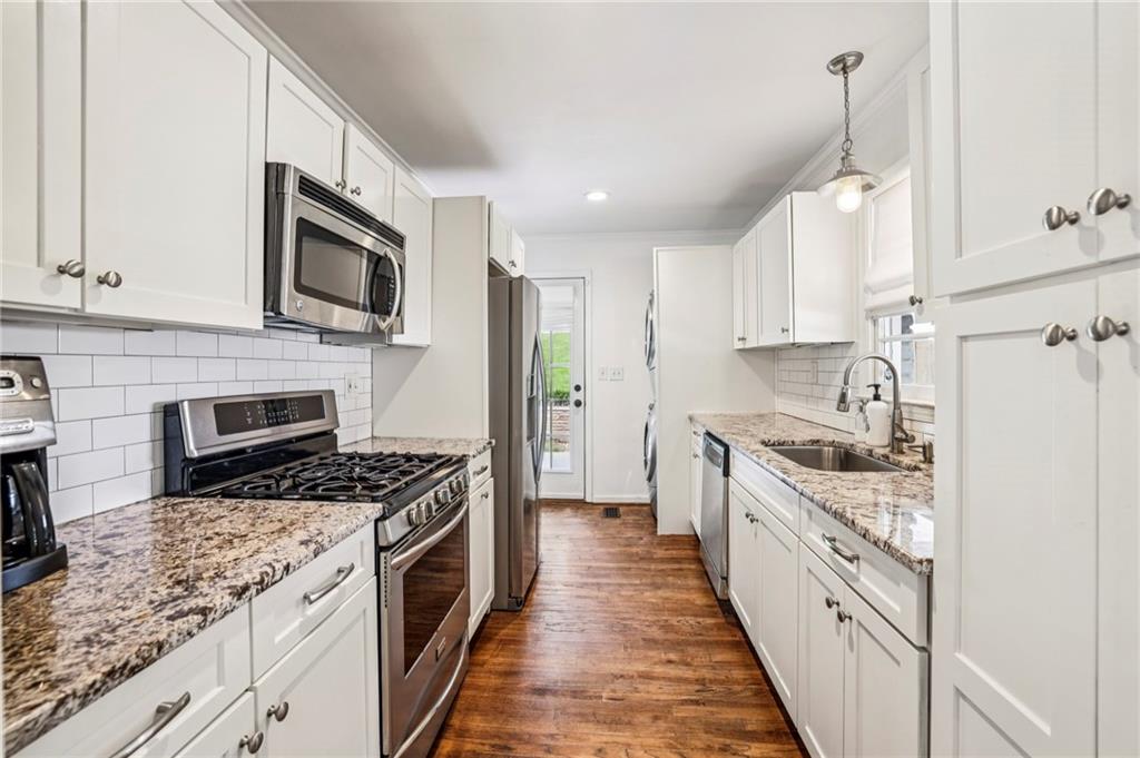 2226 Fairway Circle Northeast Brookhaven, GA 30319 - Photo 10 of 26 a large kitchen with a stove top oven