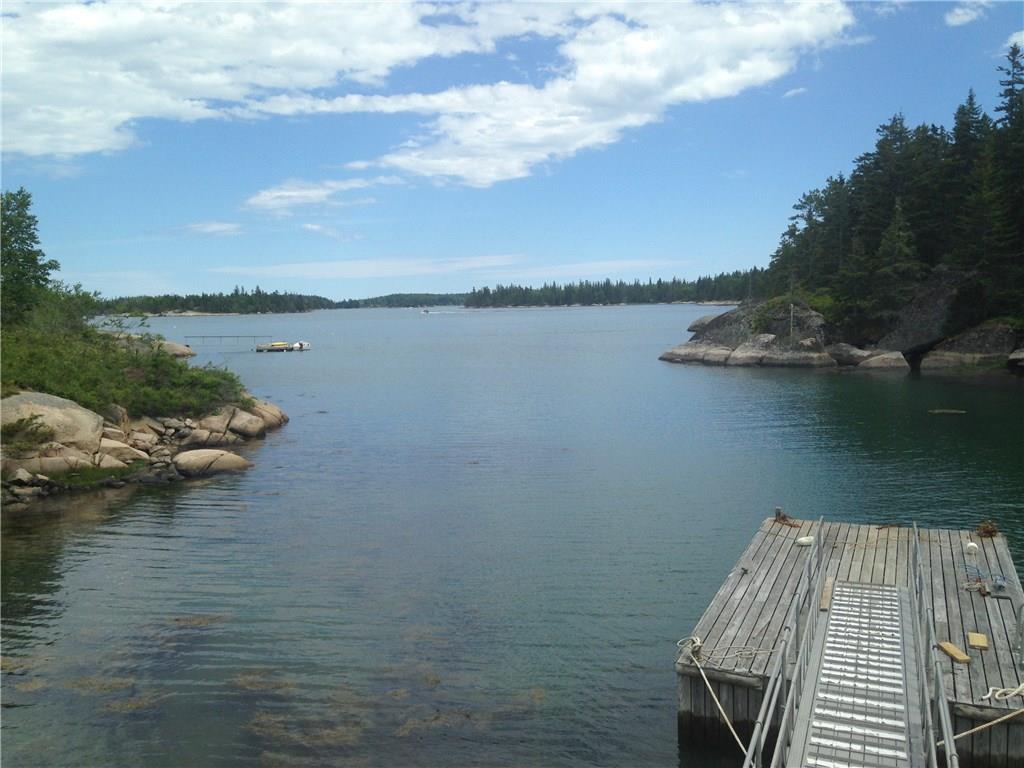 127 Ames Cv Road Vinalhaven, ME 04863 - Photo 3 of 24 Dock, in coming tide, with view...