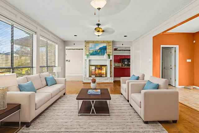 a kitchen with stainless steel appliances granite countertop a stove oven and a refrigerator