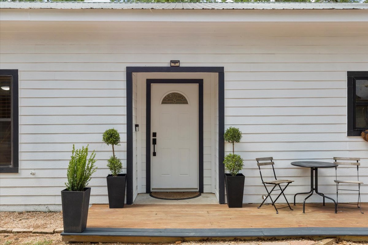 a front view of a house with seating