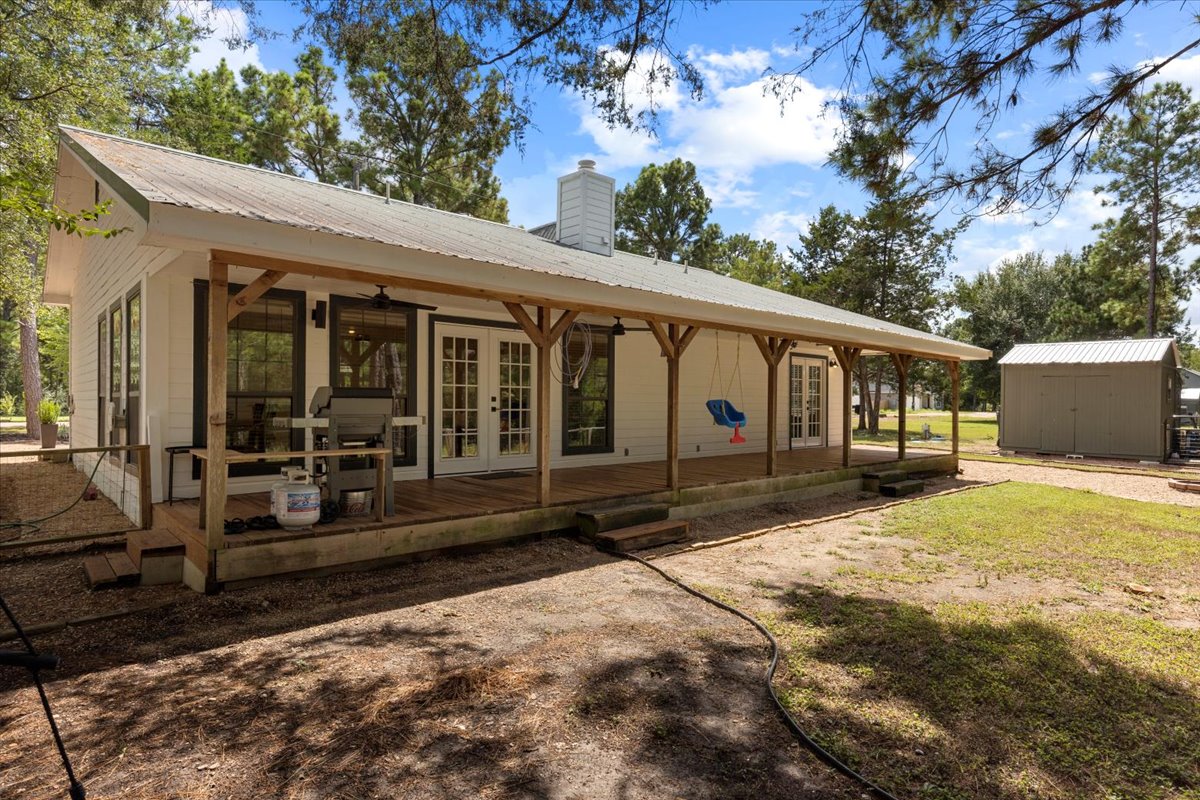 120 Lake Point Way Bastrop, TX 78602 - Photo 30 of 40 a front view of a house with garden