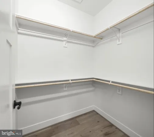 a view of a bathroom with sink and mirror