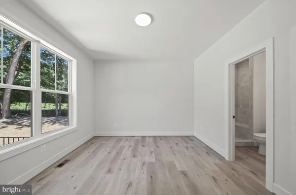 a view of an empty walk in closet
