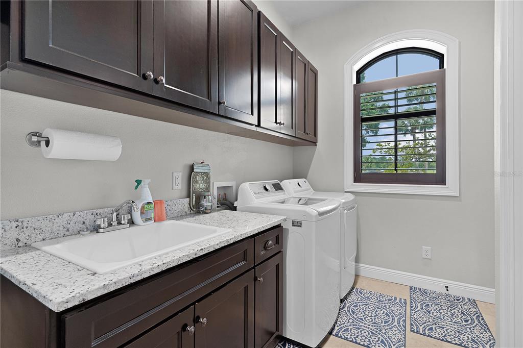 10994 North River Ranch Path Crystal River, FL 34428 - Photo 25 of 58 a bathroom with a sink and a mirror