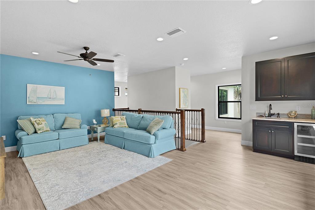 10994 North River Ranch Path Crystal River, FL 34428 - Photo 30 of 58 a living room with furniture and a flat screen tv