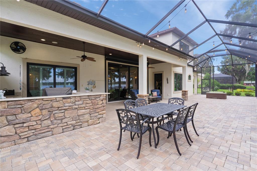 10994 North River Ranch Path Crystal River, FL 34428 - Photo 51 of 58 a view of a dinning table and chairs in the patio