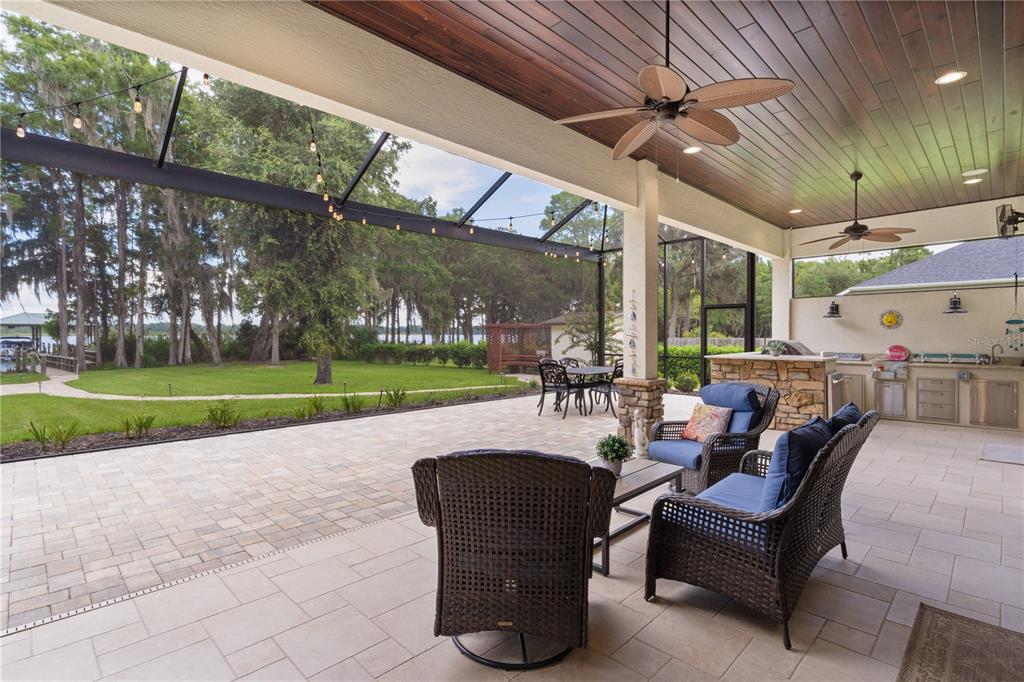 10994 North River Ranch Path Crystal River, FL 34428 - Photo 54 of 58 a view of a patio with couches table and chairs
