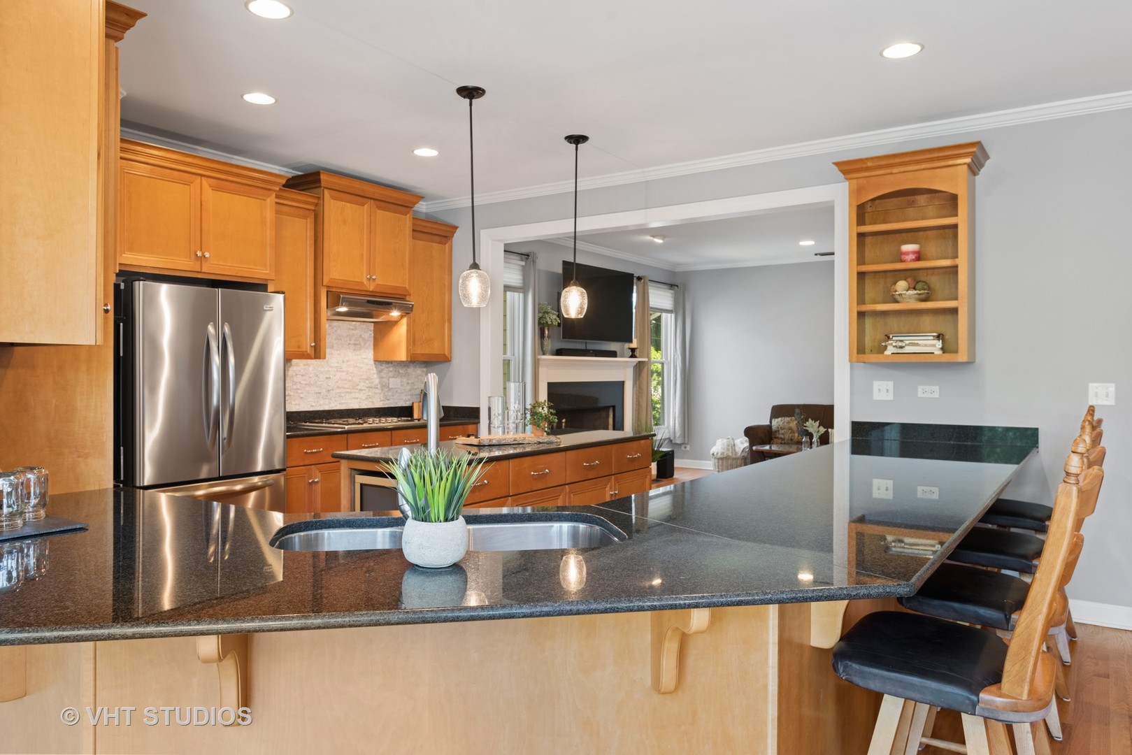 N210 Silverleaf Boulevard Wheaton, IL 60187 - Photo 14 of 48 a kitchen with counter top space and stainless steel appliances