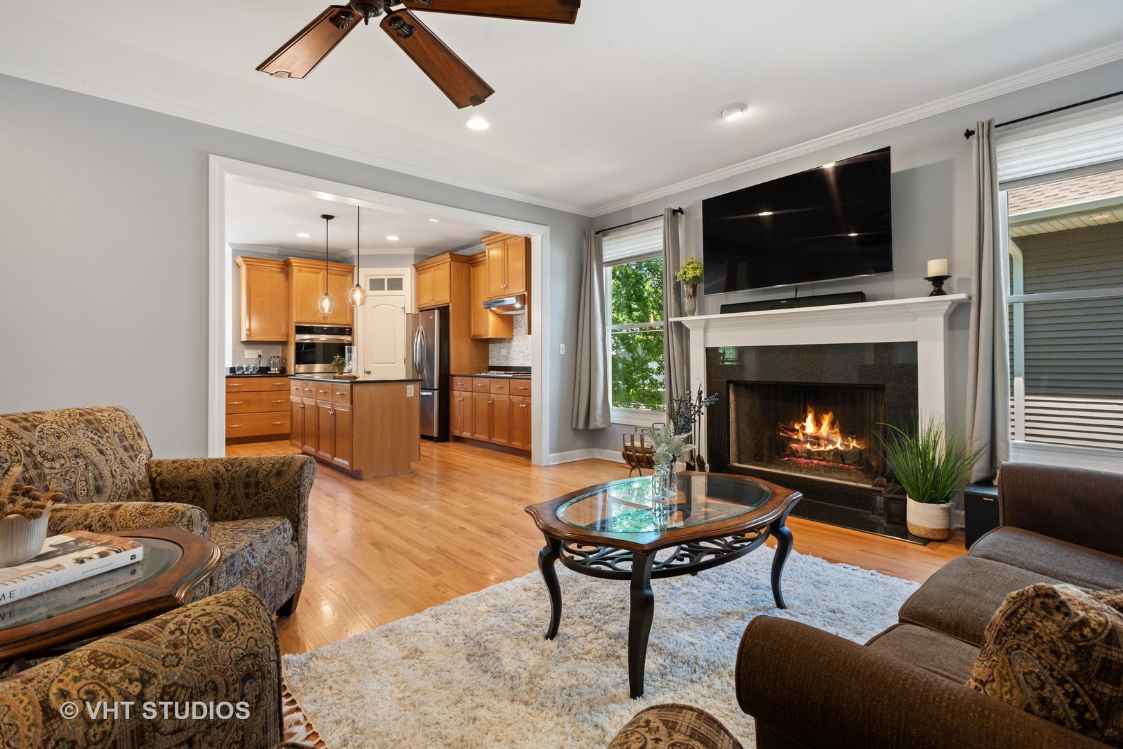 N210 Silverleaf Boulevard Wheaton, IL 60187 - Photo 20 of 48 a living room with furniture and a fireplace