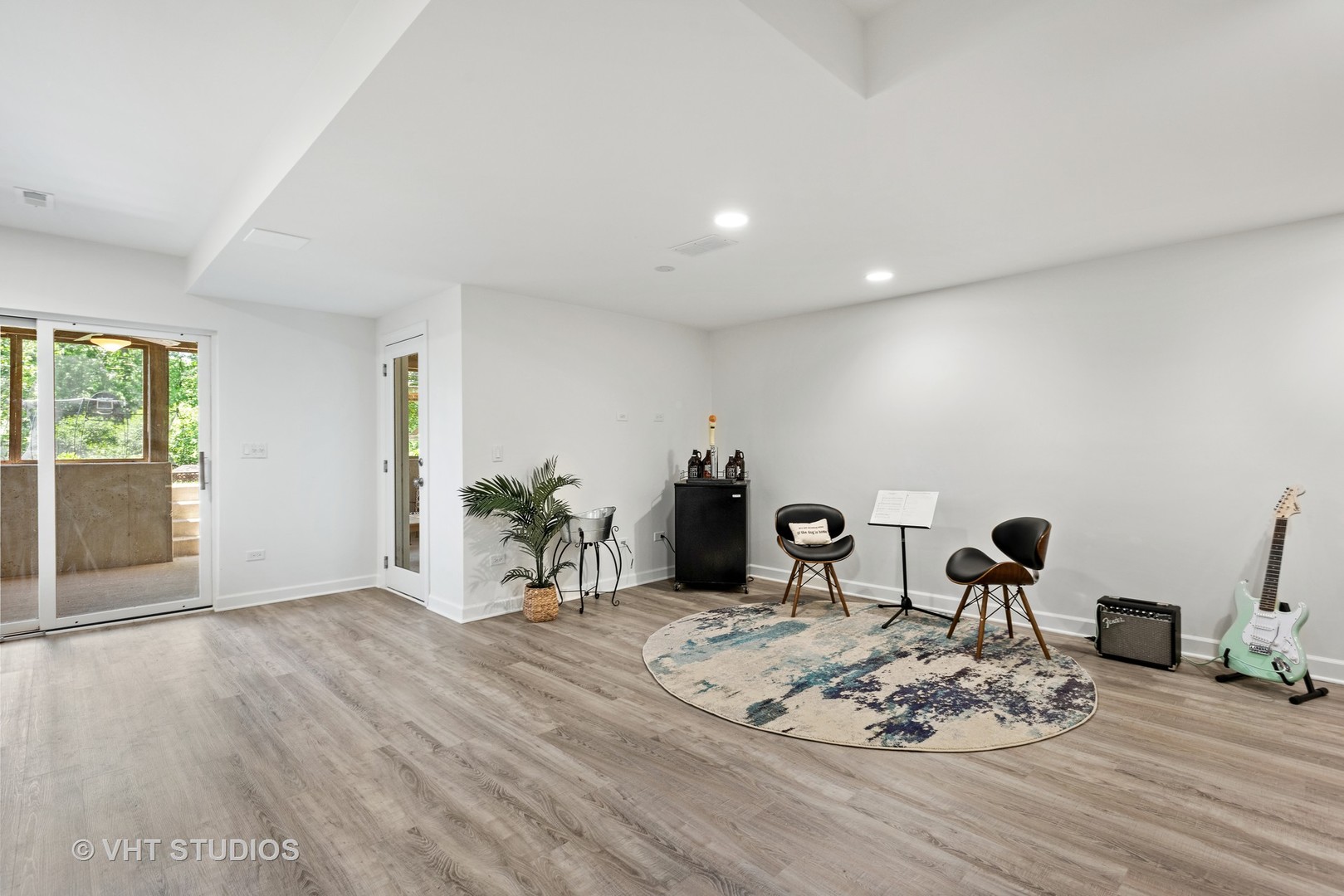 N210 Silverleaf Boulevard Wheaton, IL 60187 - Photo 36 of 48 a living room with furniture large window and wooden floor
