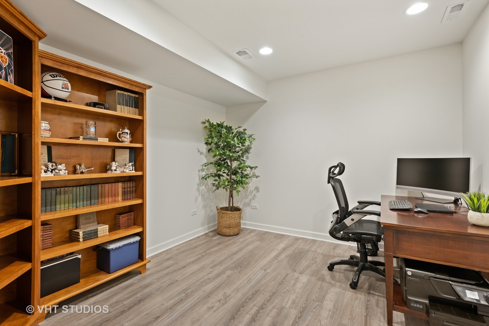 N210 Silverleaf Boulevard Wheaton, IL 60187 - Photo 39 of 48 a view of a workspace with furniture