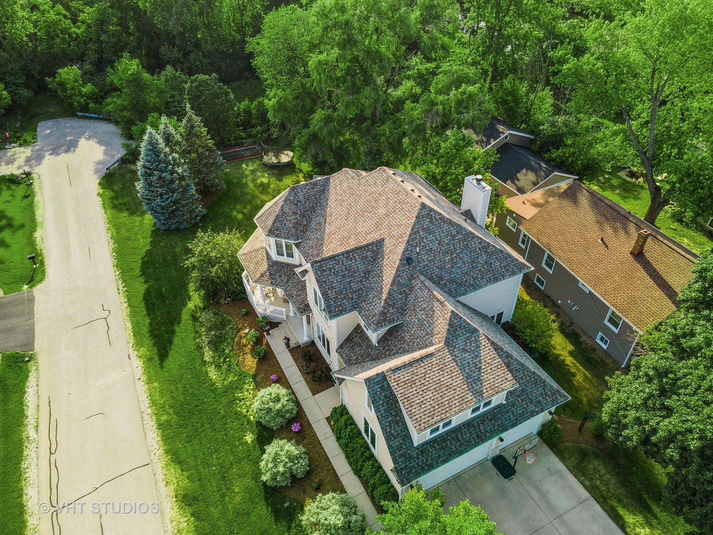 N210 Silverleaf Boulevard Wheaton, IL 60187 - Photo 5 of 48 an aerial view of a house with a yard and lake view