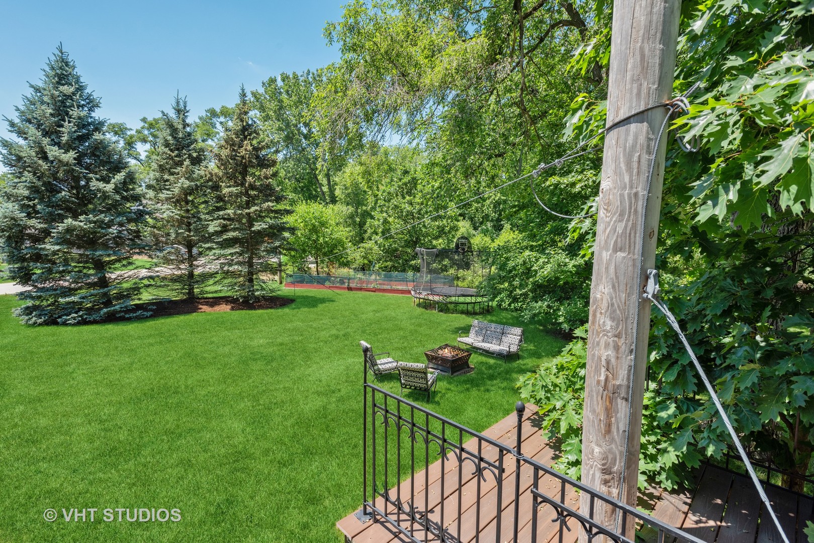 N210 Silverleaf Boulevard Wheaton, IL 60187 - Photo 44 of 48 a view of a deck with a yard