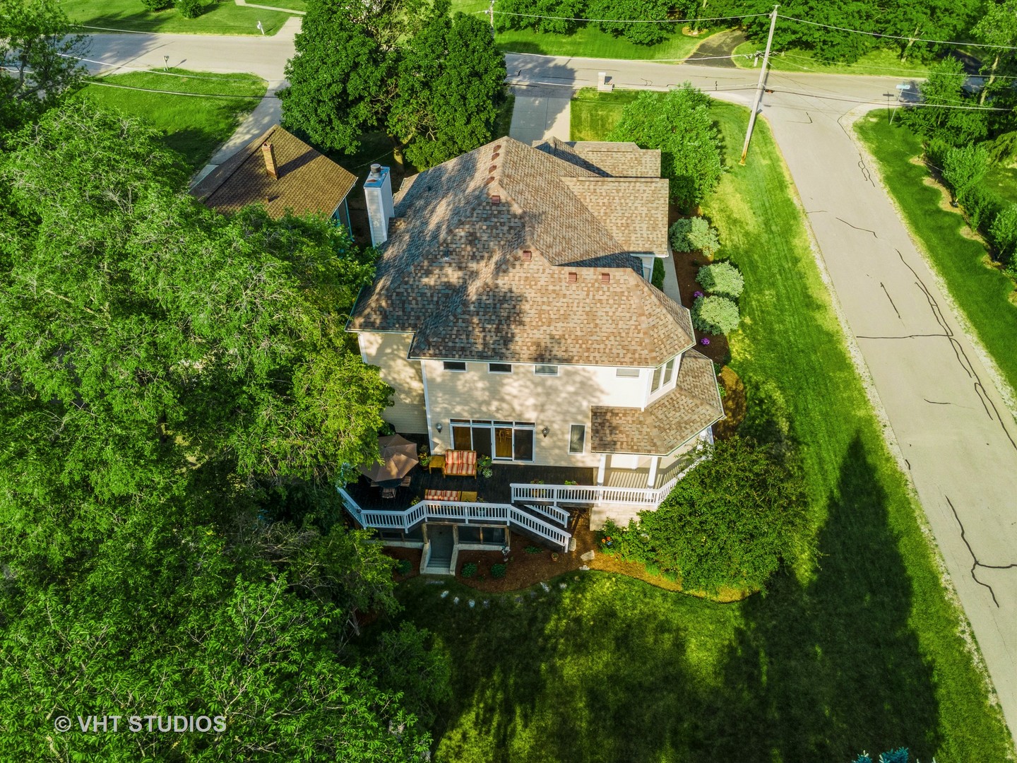 N210 Silverleaf Boulevard Wheaton, IL 60187 - Photo 6 of 48 a aerial view of a house with table and chairs