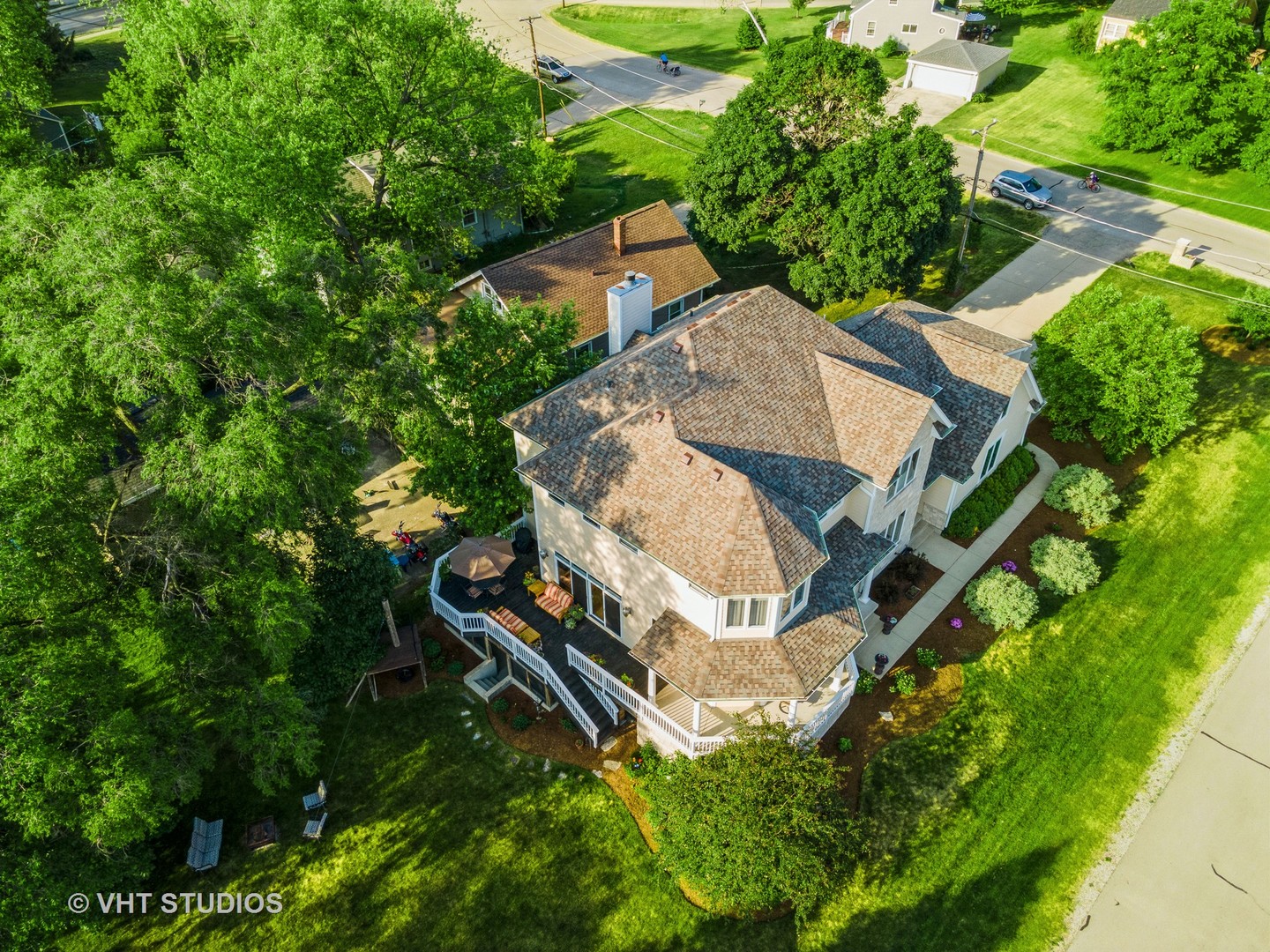 N210 Silverleaf Boulevard Wheaton, IL 60187 - Photo 7 of 48 an aerial view of a house with a yard and trees