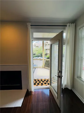 a view of a room with a large window