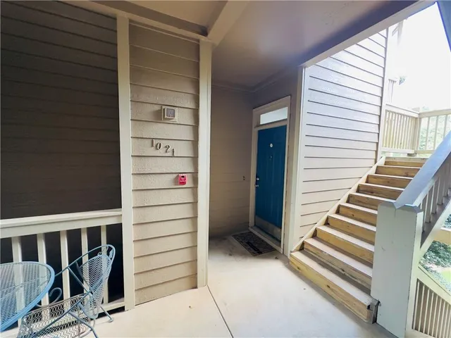 a view of a balcony with stairs