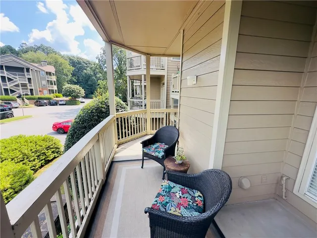 a view of a porch with furniture