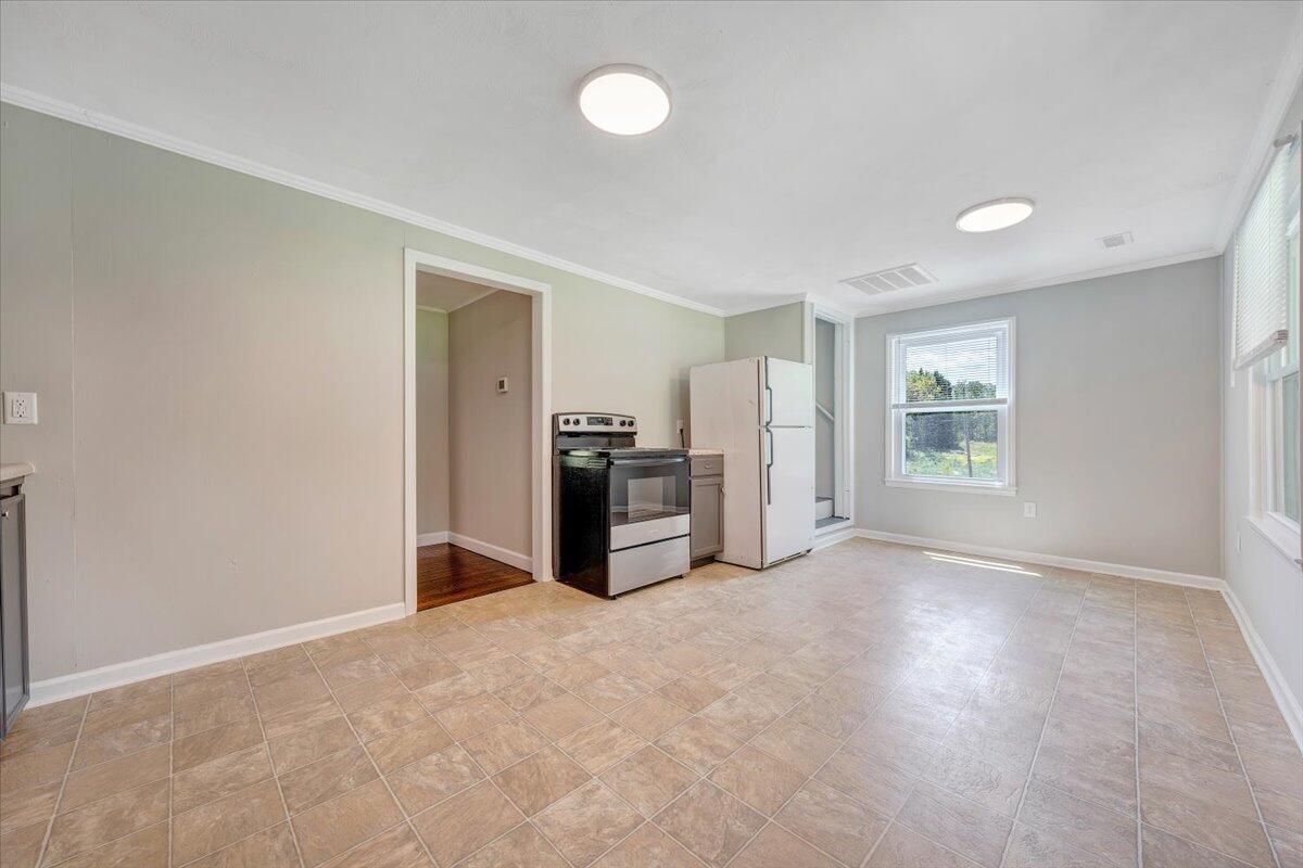 350 Mills Road Callaway, VA 24067 - Photo 11 of 45 an empty room with windows and closet