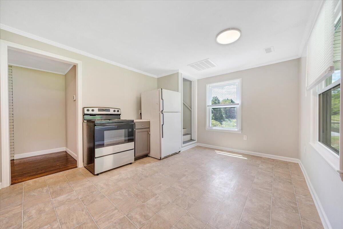 350 Mills Road Callaway, VA 24067 - Photo 12 of 45 a view of a kitchen with electric appliances and windows