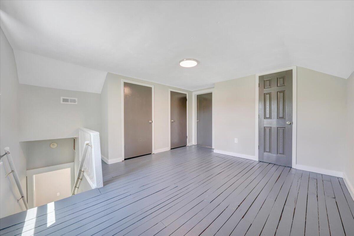 350 Mills Road Callaway, VA 24067 - Photo 17 of 45 a view of empty room with wooden floor