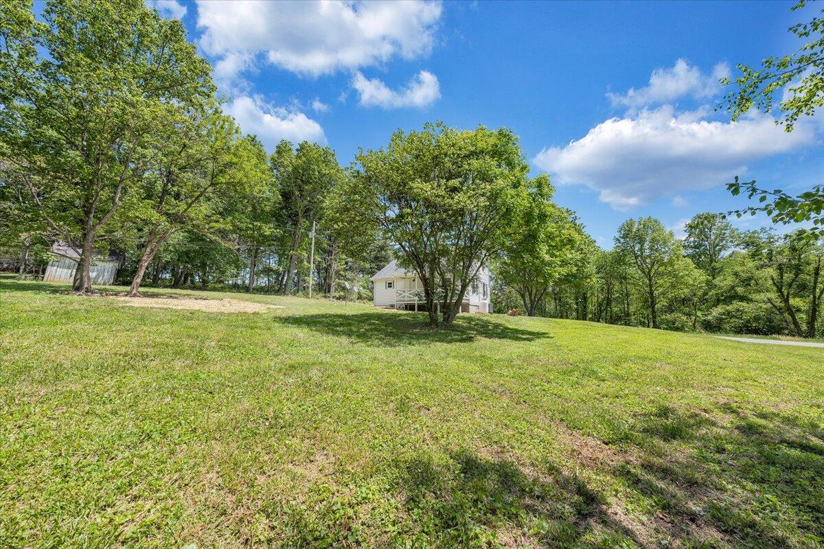 350 Mills Road Callaway, VA 24067 - Photo 30 of 45 a view of field with trees in the background