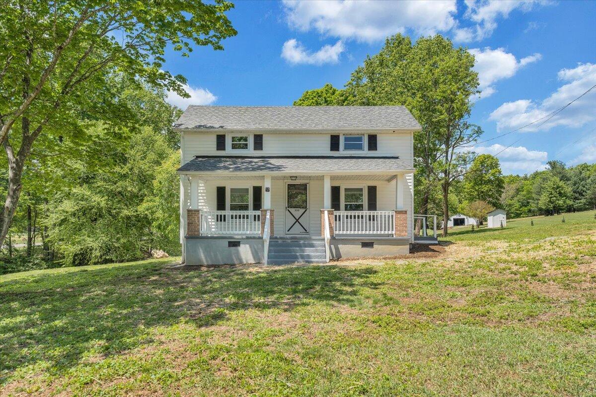 350 Mills Road Callaway, VA 24067 - Photo 40 of 45 a front view of a house with a yard