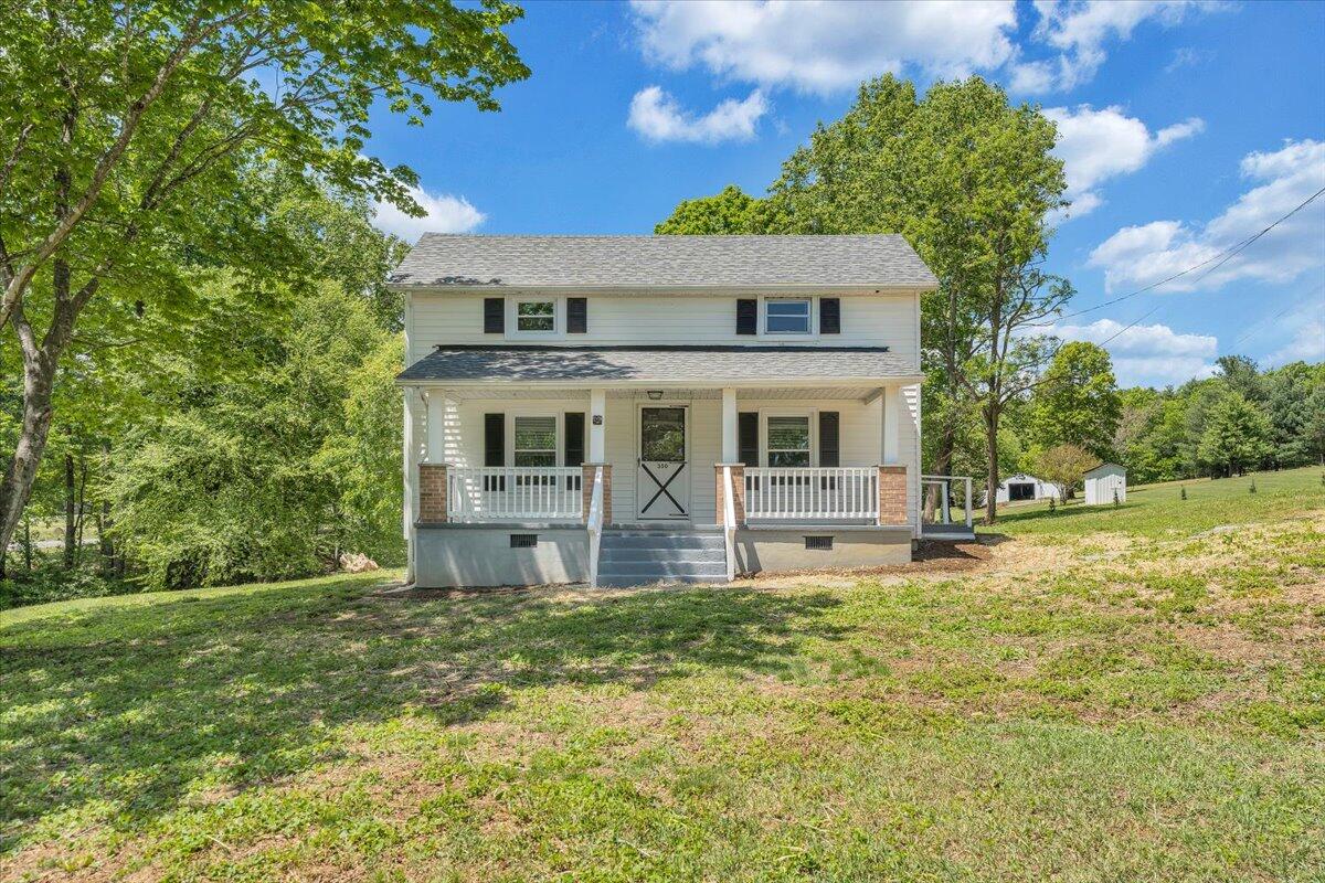 350 Mills Road Callaway, VA 24067 - Photo 41 of 45 a front view of a house with a yard