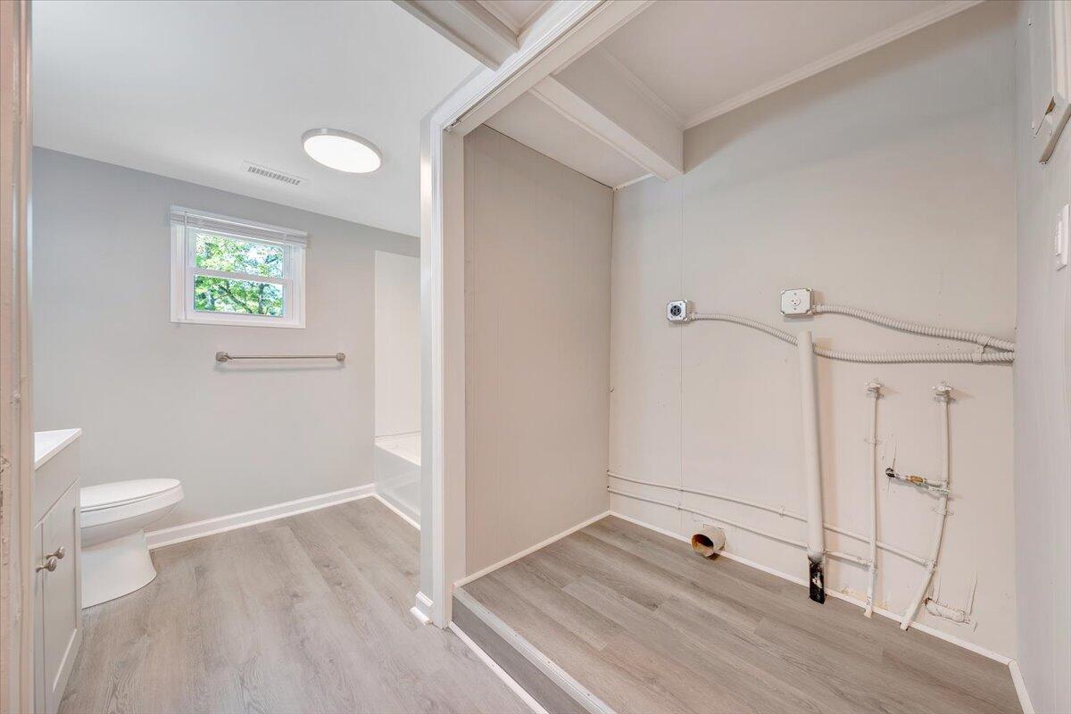 350 Mills Road Callaway, VA 24067 - Photo 8 of 45 a view of a room with wooden floor and white walls