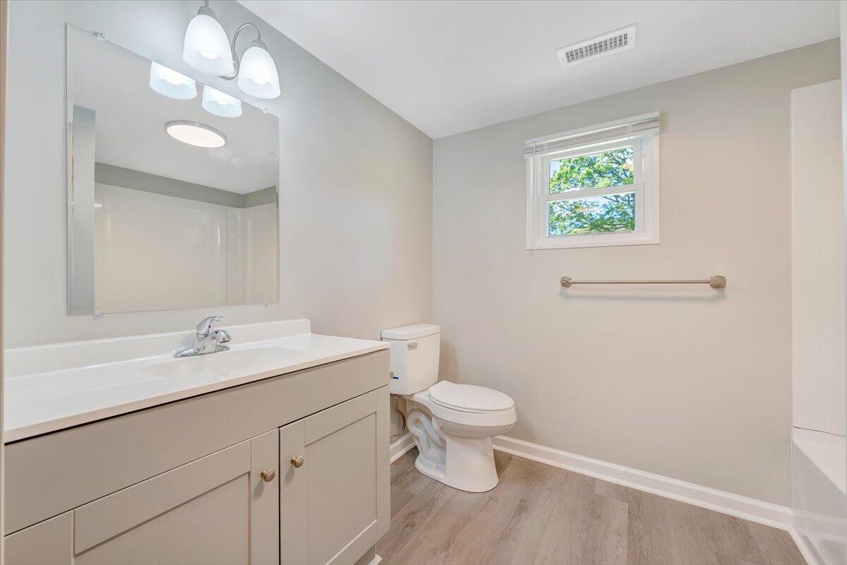 350 Mills Road Callaway, VA 24067 - Photo 9 of 45 a bathroom with a toilet sink and mirror