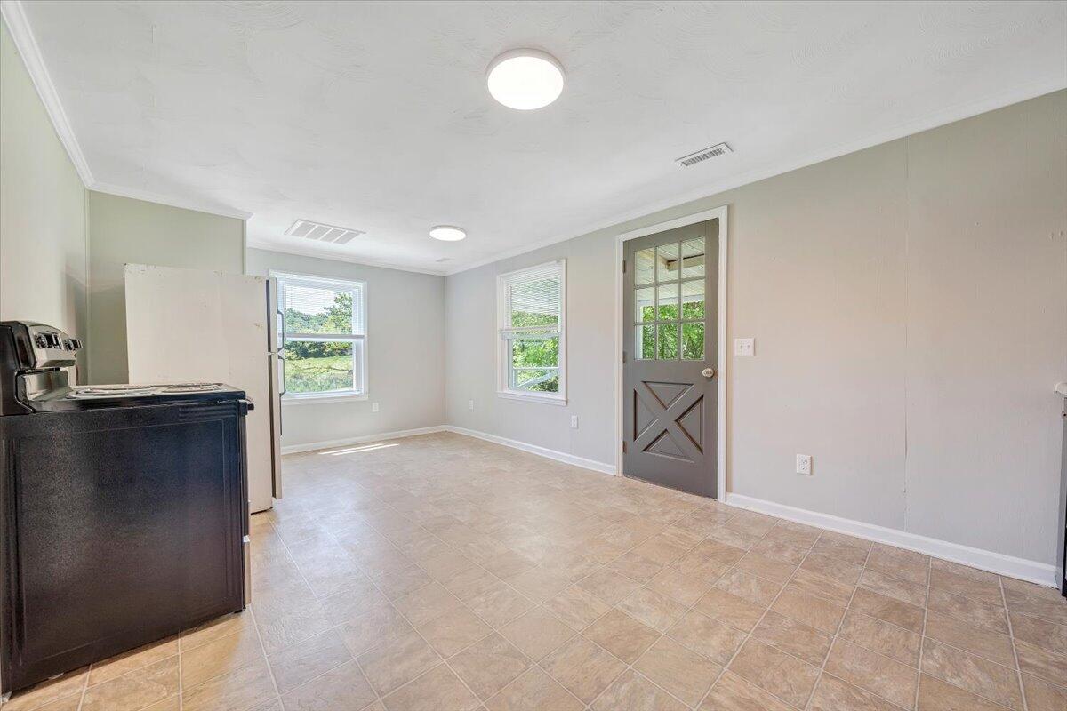 350 Mills Road Callaway, VA 24067 - Photo 10 of 45 an empty room with windows and closet