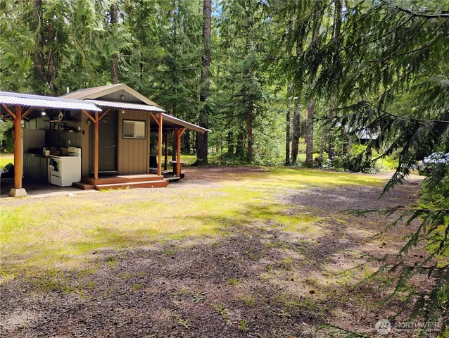 a view of swimming pool with a yard