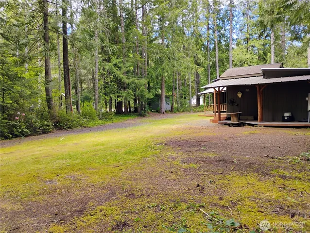 a front view of a building with garden