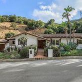 front view of a house with a street