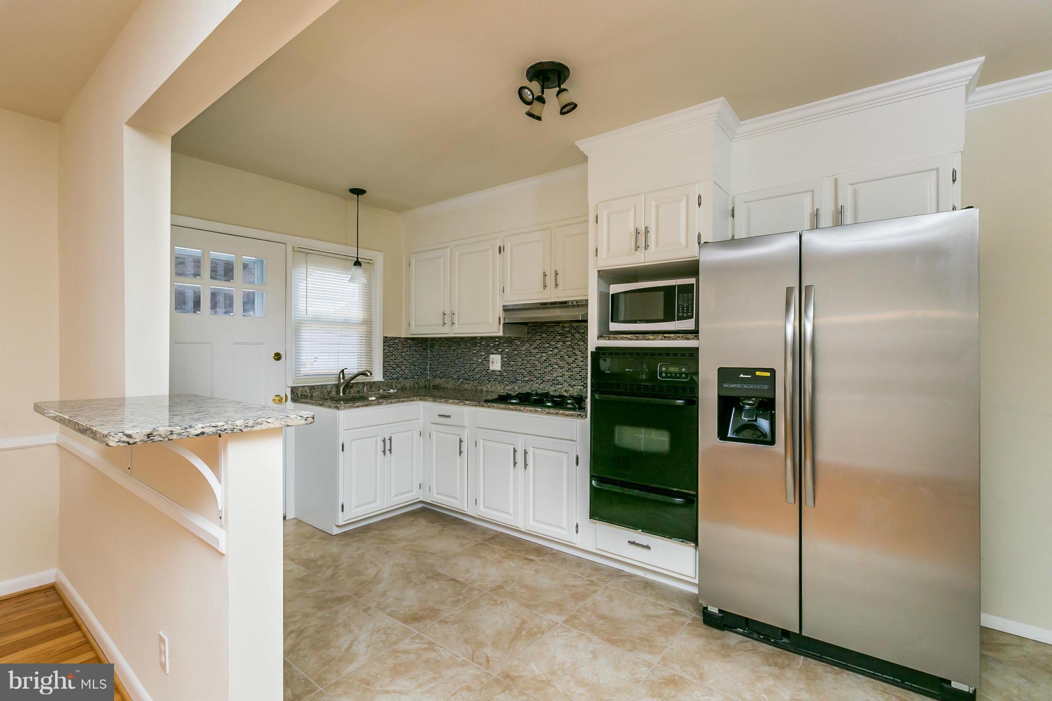 1222 Silverthorne Road Baltimore, MD 21239 - Photo 1 of 22 Kitchen
