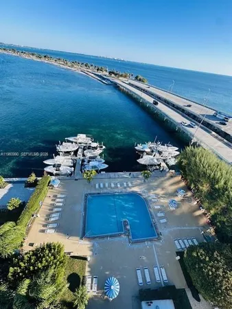 a view of a balcony with chairs
