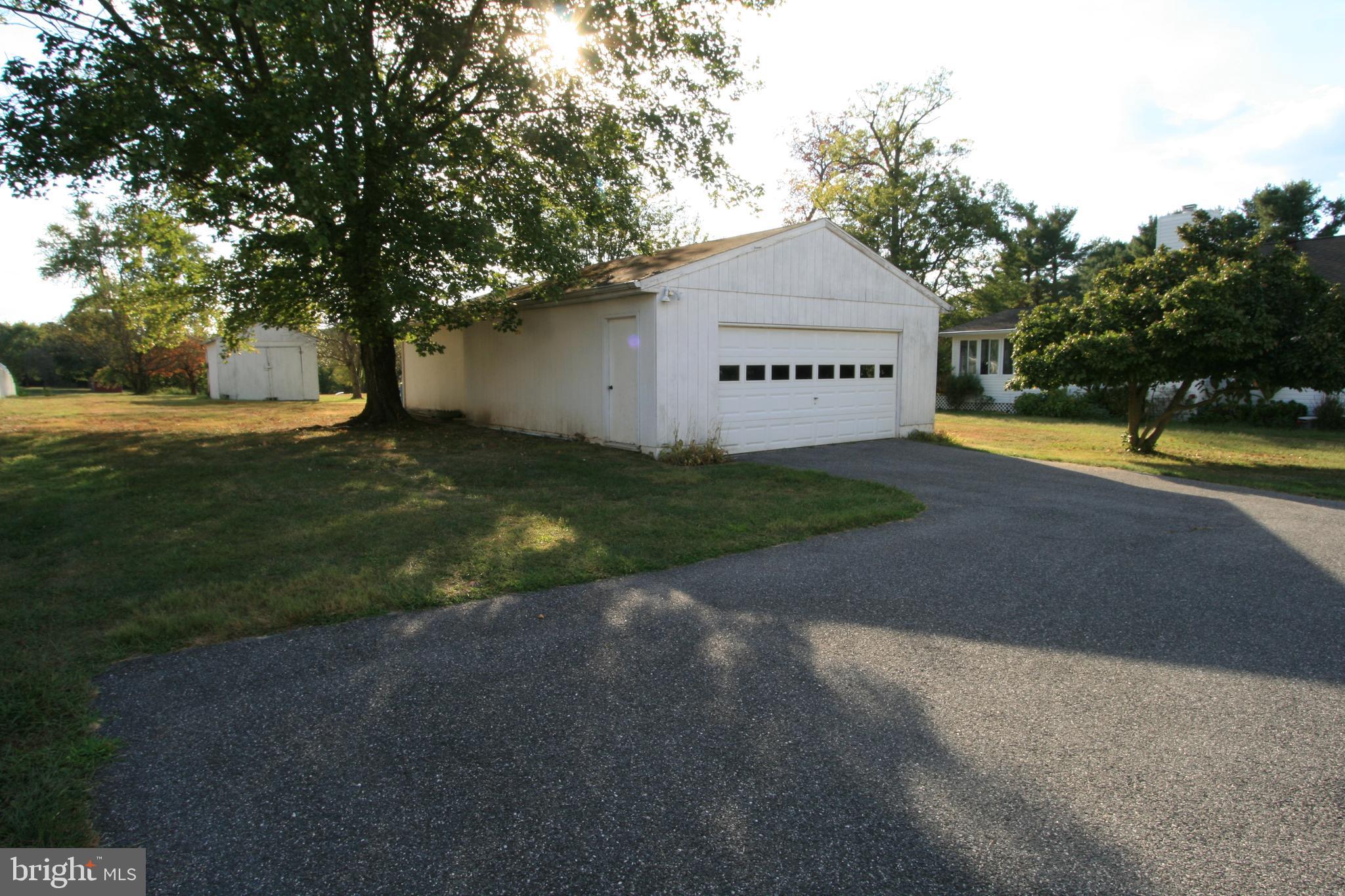 8317 Grove Road Ellicott City, MD 21043 - Photo 3 of 22 Front 2 car garage and lots of parking area