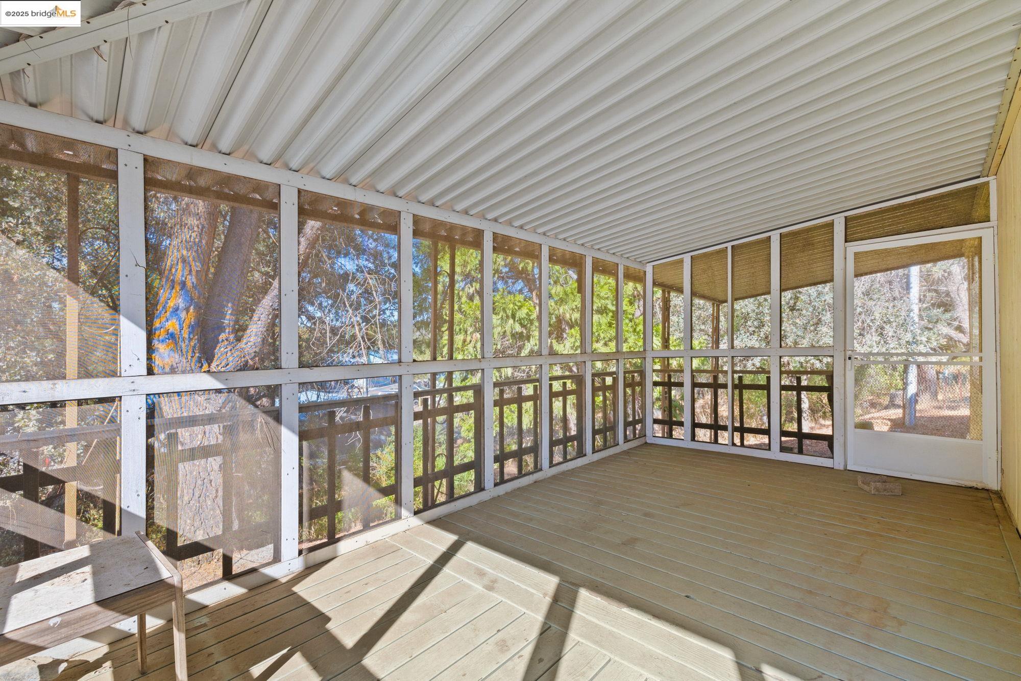 10956 Green Street, Unit 186 Columbia, CA 95310 - Photo 18 of 21 View of unfurnished sunroom