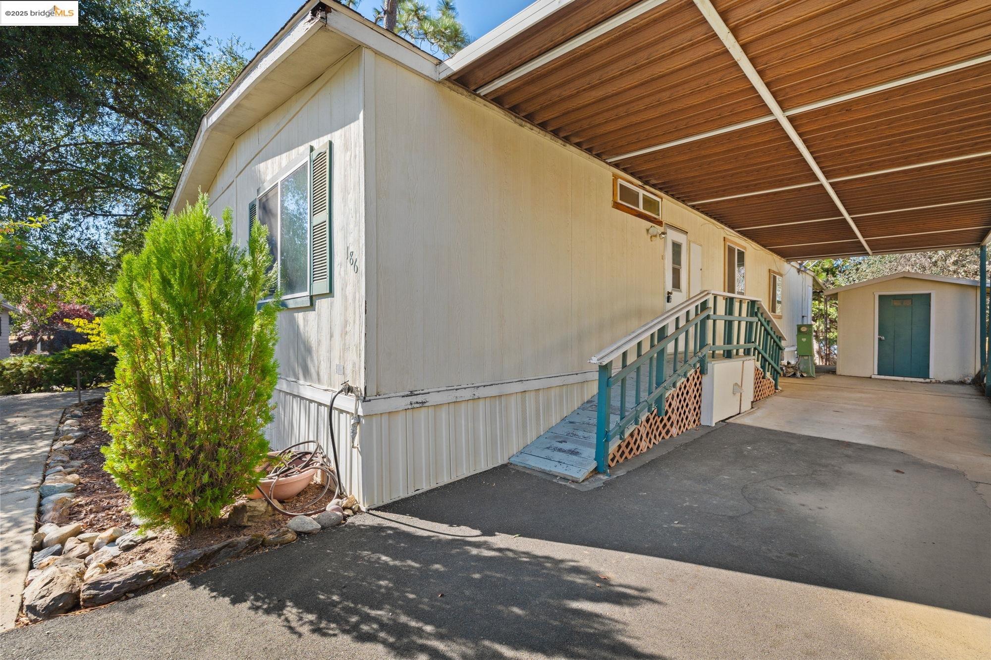 10956 Green Street, Unit 186 Columbia, CA 95310 - Photo 21 of 21 View of property exterior with a storage unit