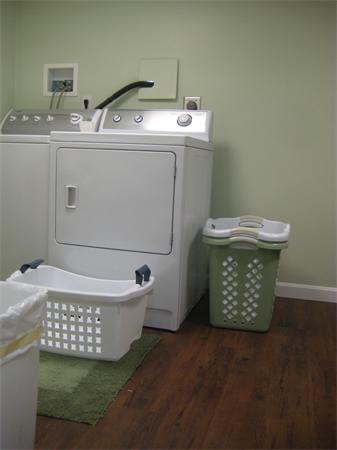 98 Adams Road Grafton, MA 01536 - Photo 11 of 15 a room with a washing machine
