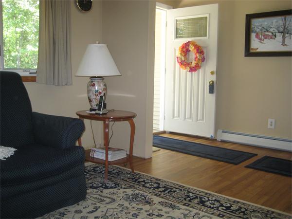 98 Adams Road Grafton, MA 01536 - Photo 4 of 15 a front view of a house with garden