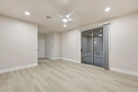 a bathroom with a sink a mirror and a toilet