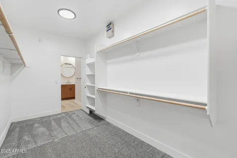 a front view of a house with yard and green space