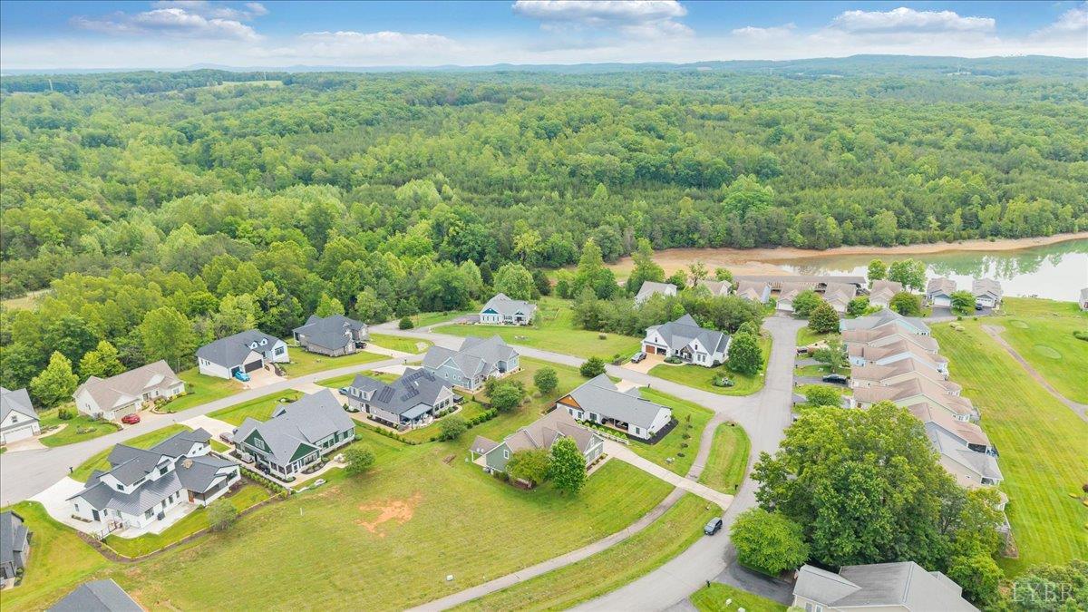 1250 Our Cove Road Huddleston, VA 24104 - Photo 62 of 70 a view of a swimming pool with a yard