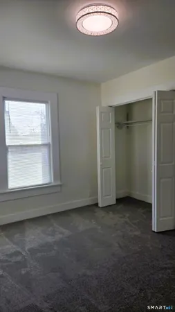 an empty room with window