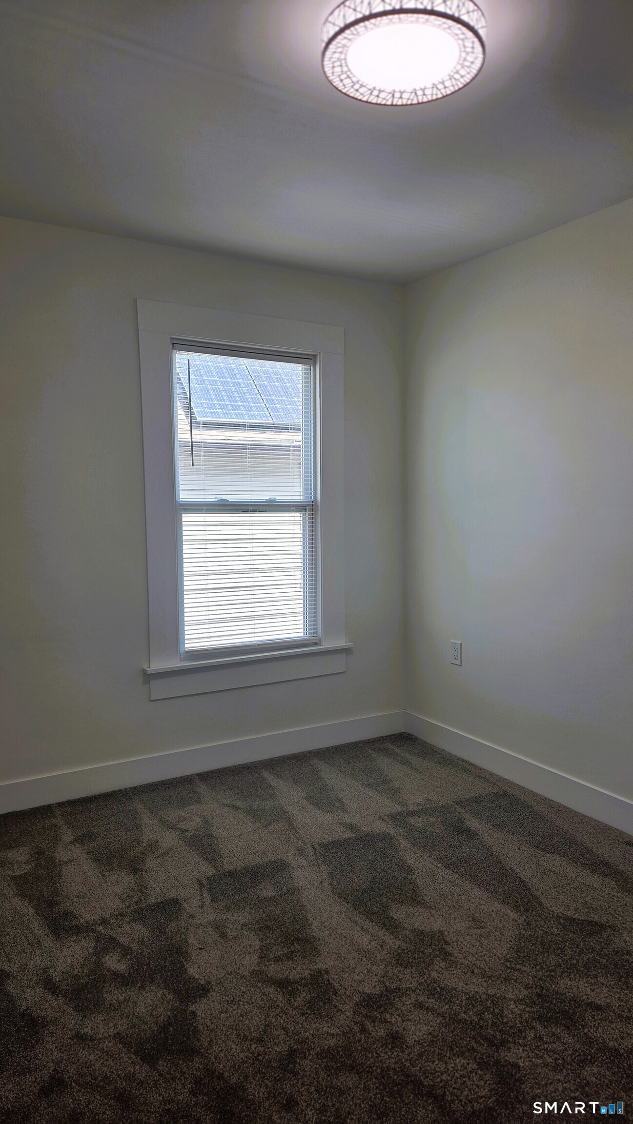 14 Meadow Street Ansonia, CT 06401 - Photo 13 of 25 an empty room with a window