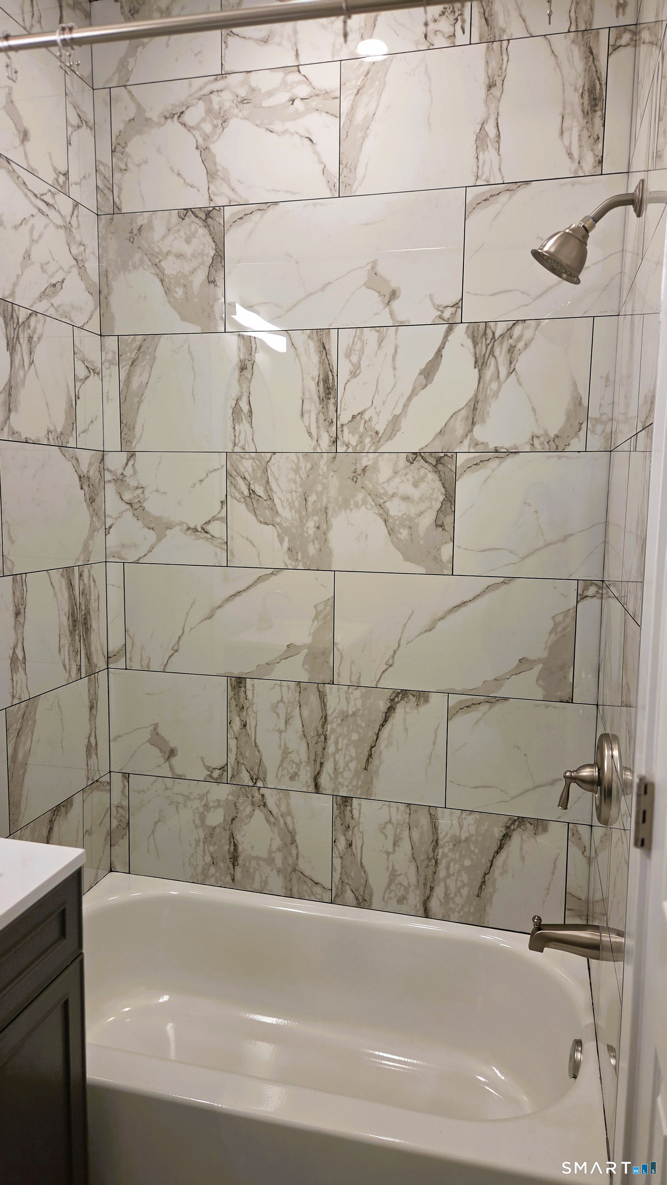 14 Meadow Street Ansonia, CT 06401 - Photo 19 of 25 a bathroom with a bathtub