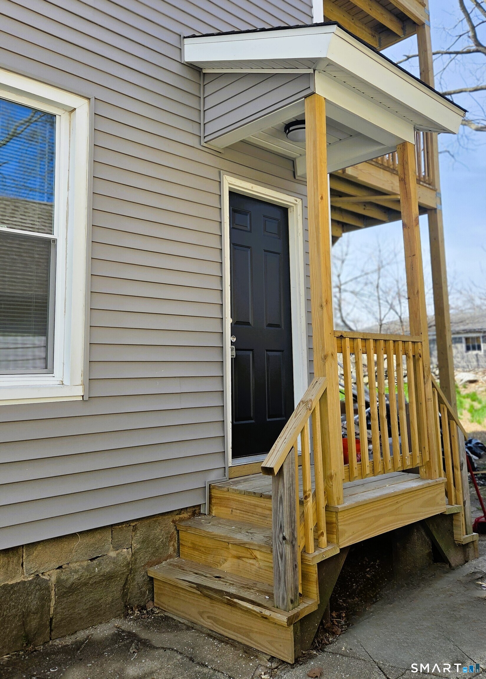 14 Meadow Street Ansonia, CT 06401 - Photo 4 of 25 a view of a house with a door