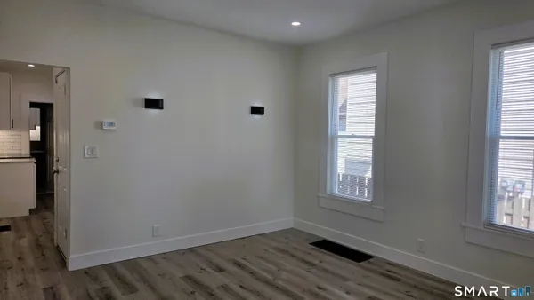 an empty room with windows