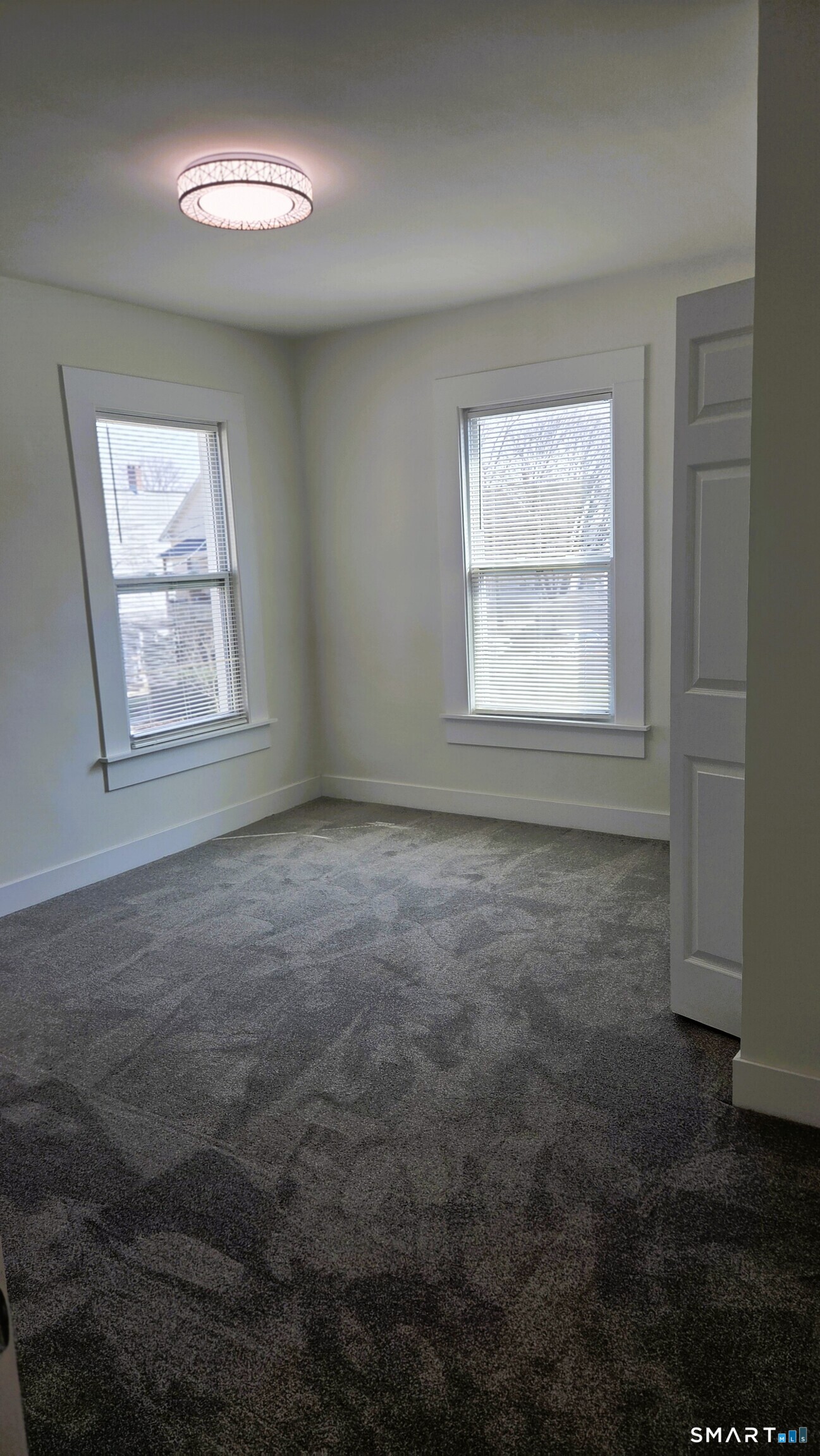 14 Meadow Street Ansonia, CT 06401 - Photo 10 of 25 a view of an empty room with a window